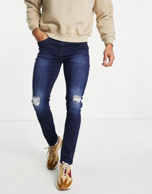 Another Influence skinny jeans with rips in mid blue
