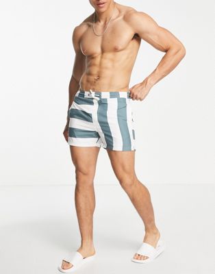Another Influence swim shorts in green contrast stripe print