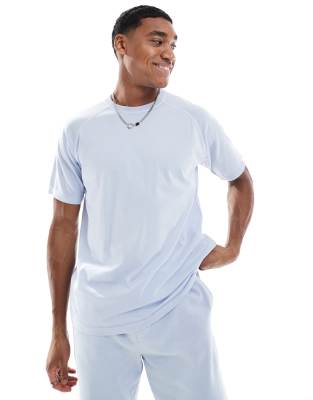 T-Shirt in intensiver Acid-Waschung in Blau mit Ziernähten Blau Chest 36-38
