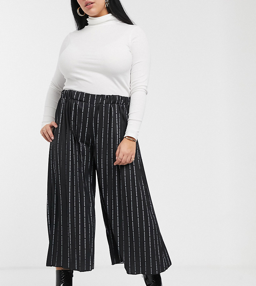 Another Reason Plus relaxed pleated trouses in repeat text print-Black