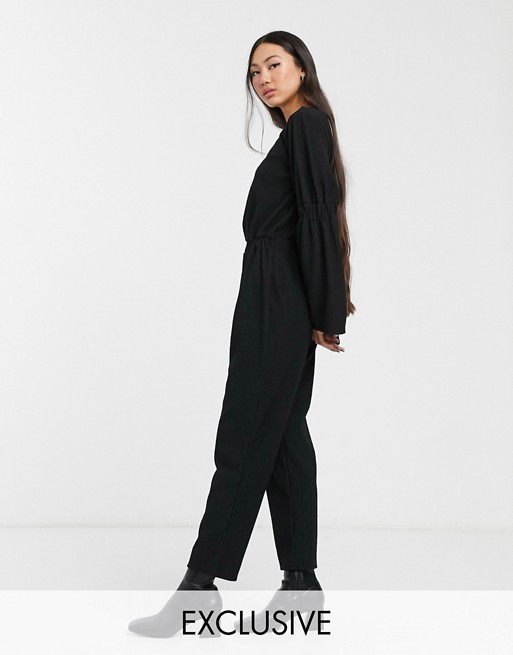 Another Reason relaxed jumpsuit with open back and ruched detail