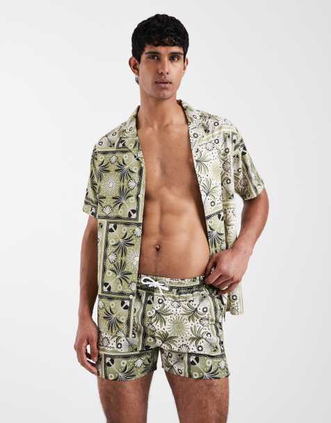 Aray palm tree motif swimsuit in mid green - view 1