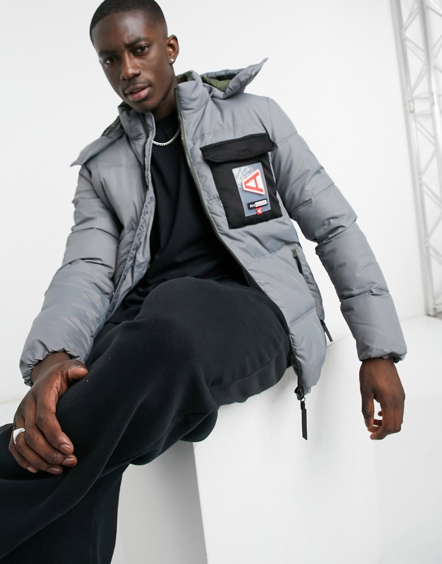 Arcminute puffer jacket with branded pocket in gray-White