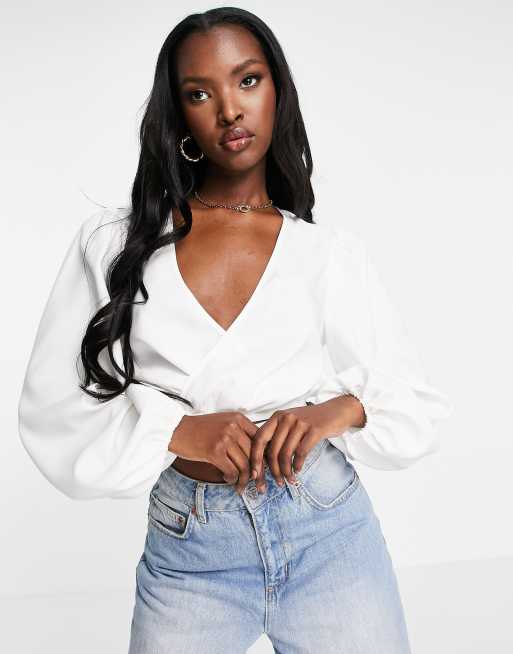 Aria Cove - Crop top avorio con scollo profondo e fascette sul davanti