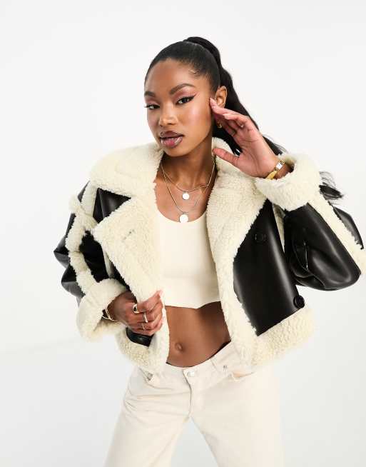 Aria Cove faux shearling contrast leather look cropped coat in black and cream ASOS