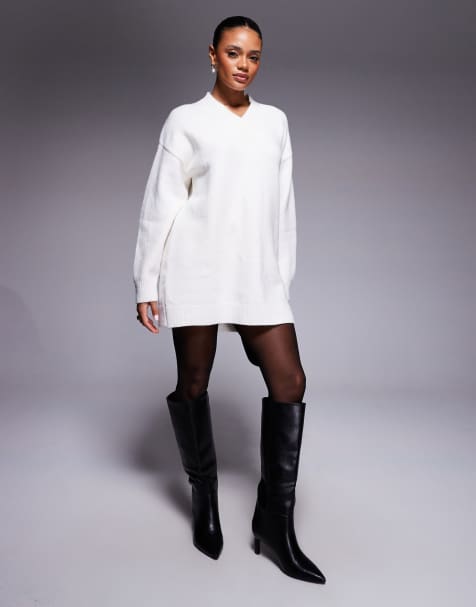 Aria Cove - Gebreide oversized mini-trui jurk met V-hals en ballonmouwen in crème - view 1