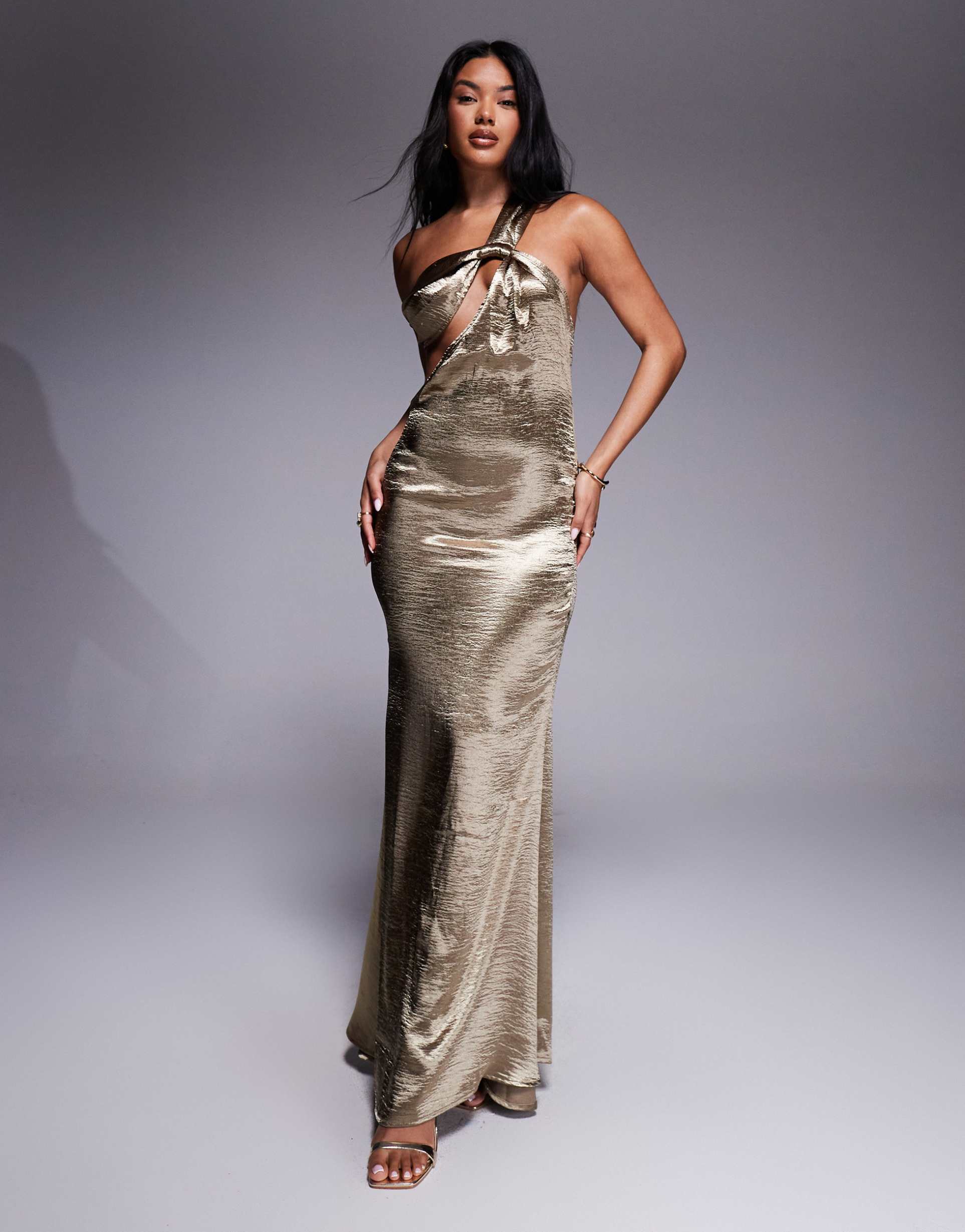 aria cove hammered satin one shoulder open back fishtail maxi dress in gold