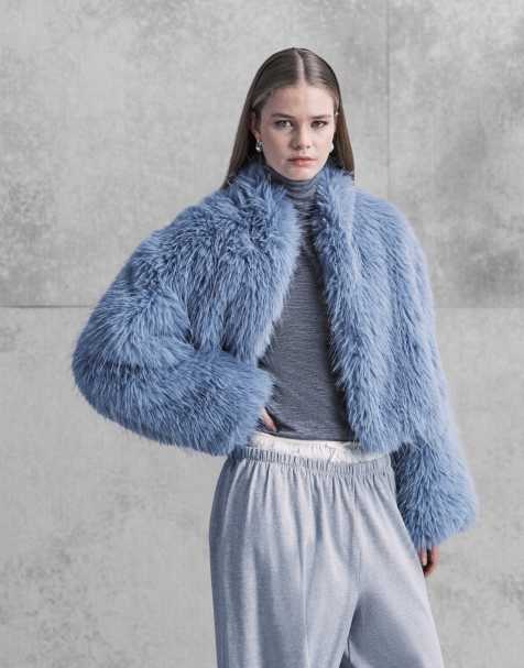 Aria Cove mongolian faux fur wide sleeve cropped jacket in blue