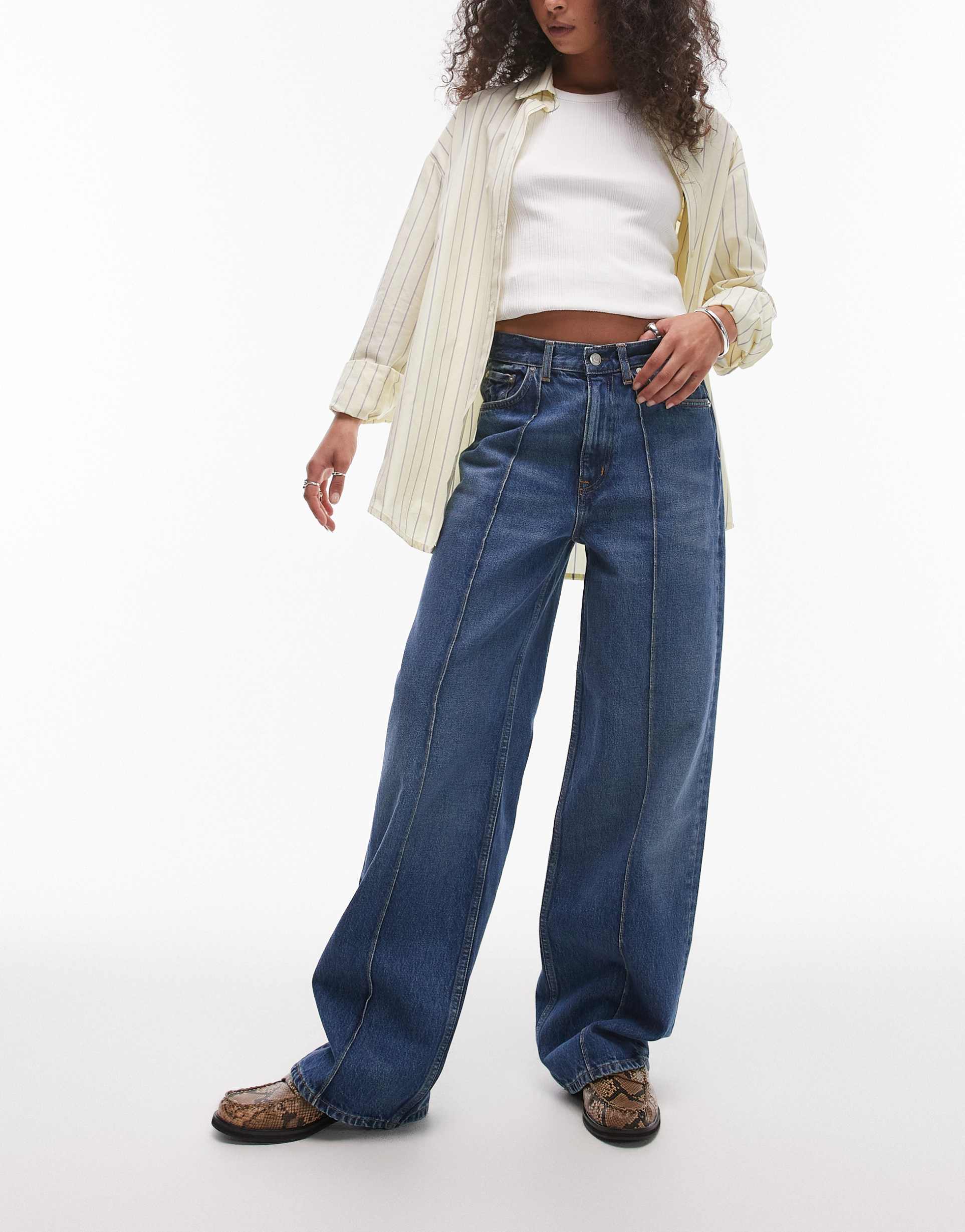 arket coral high rise relaxed leg jeans with pintuck in vintage mid washed blue