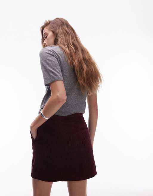ARKET corduroy mini skirt in burgundy