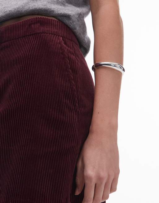 ARKET corduroy mini skirt in burgundy