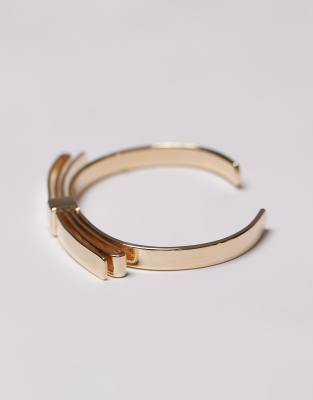 Arket ARKET gold plated cuff bracelet with bow detail