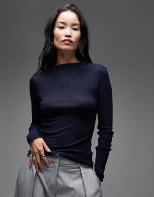 ARKET - Halbtransparentes Strickoberteil aus Merinowolle in Blau mit breitem Rippenmuster und Stehkragen