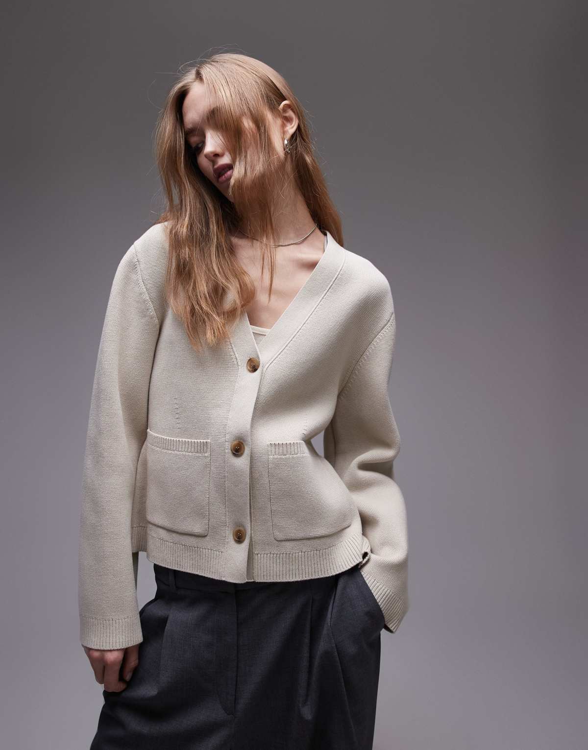 ARKET knitted compact milano stich cardigan with pockets in beige