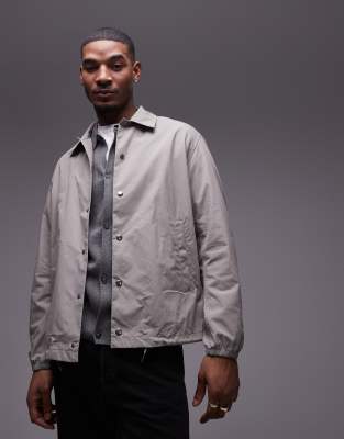 lightweight jacket with metal press-snap front in light gray