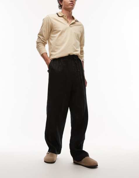 ARKET linen drawstring relaxed trousers in black - view 1