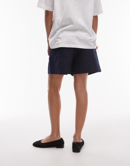 ARKET - Linnen chinoshorts met halfhoge taille in marineblauw, 2 van 5