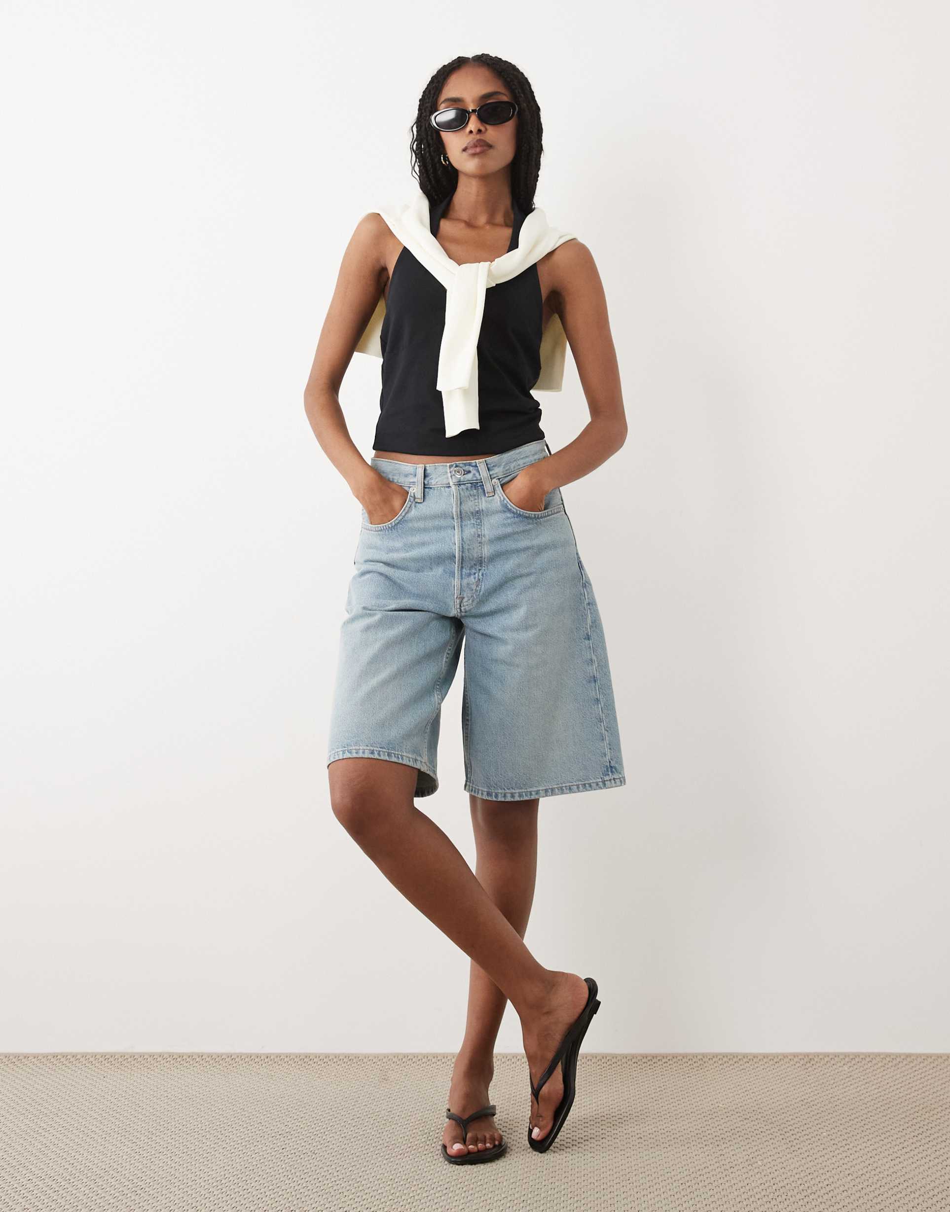 arket loose fit denim shorts in mid wash blue