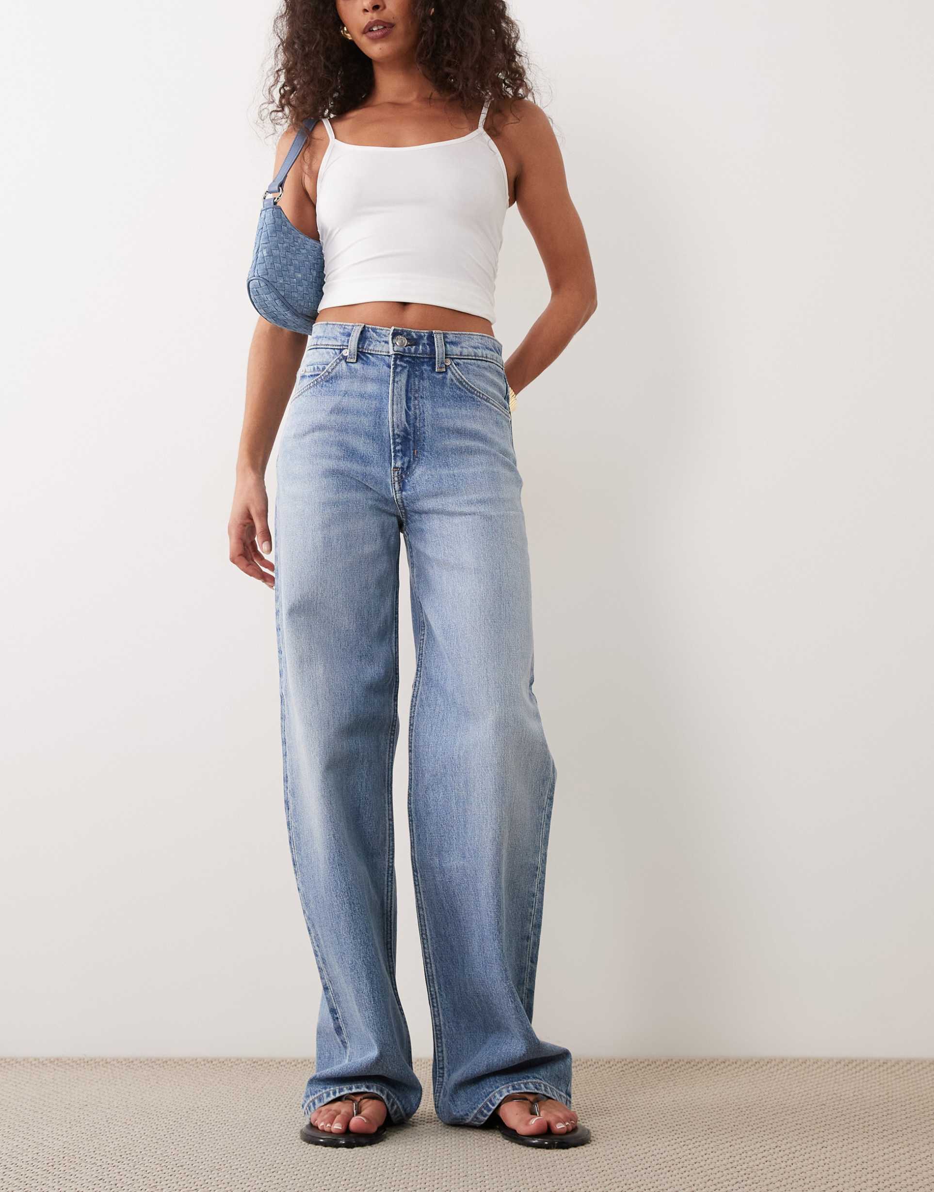 arket lupine five pocket high rise wide leg jeans in light blue wash