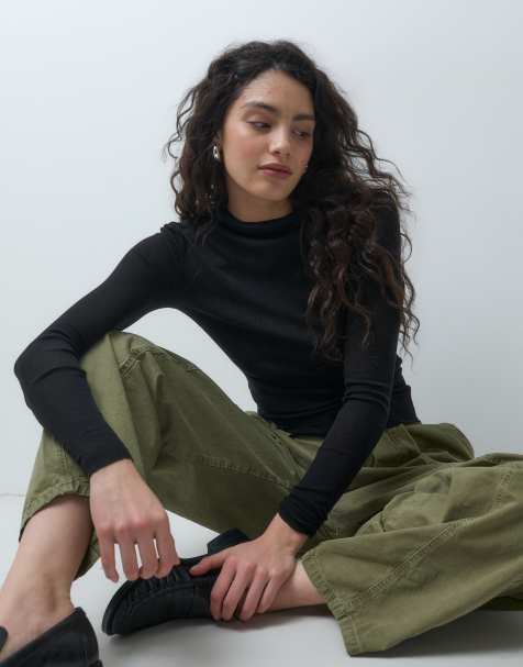 ARKET merino wool knitted semi sheer wide rib mock neck top in black