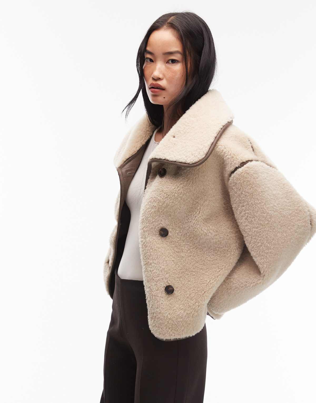 ARKET oversized faux shearling jacket in light beige with brown contrast edging