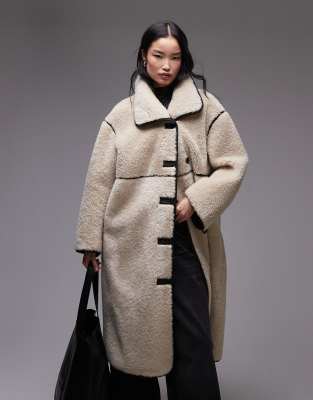 Arket oversized faux shearling midi coat with brown contrast edging in light