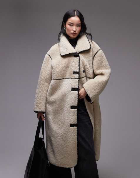 ARKET oversized faux shearling midi coat with brown contrast edging in light beige - view 1