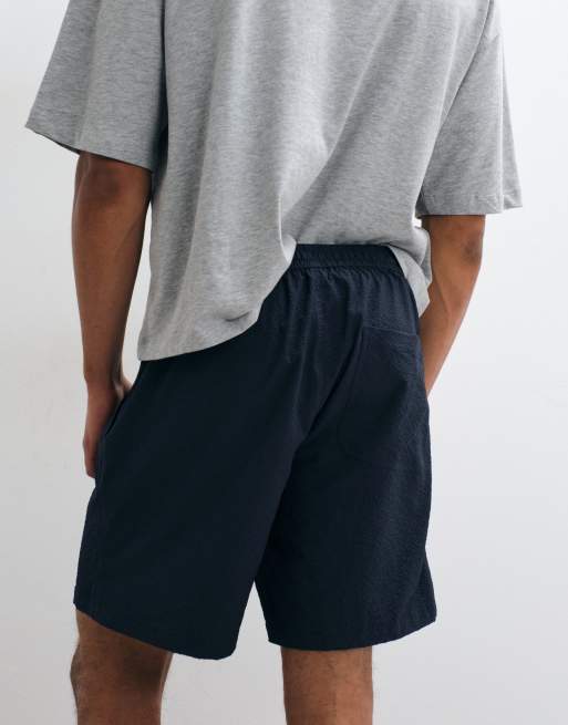 ARKET - Pantalones cortos azul marino de tejido rugoso de sirsaca, 3 de 5