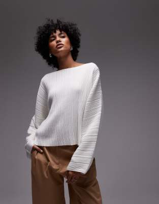 plisse knit top with open tie back in off white