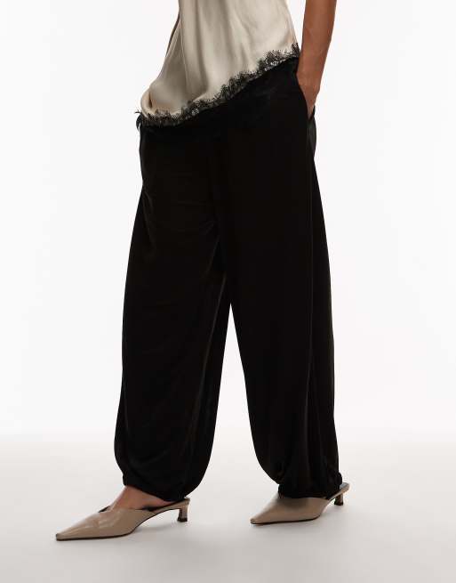 ARKET pull on balloon shape trousers with shine in black, 2 of 5