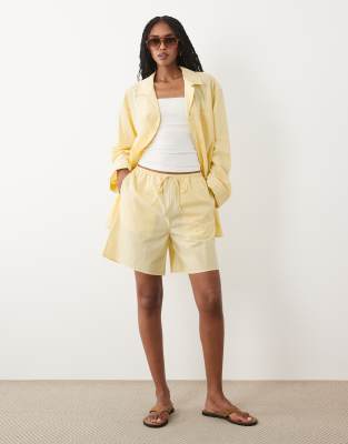 ARKET pure cotton beach shorts in yellow striped print - part of a set