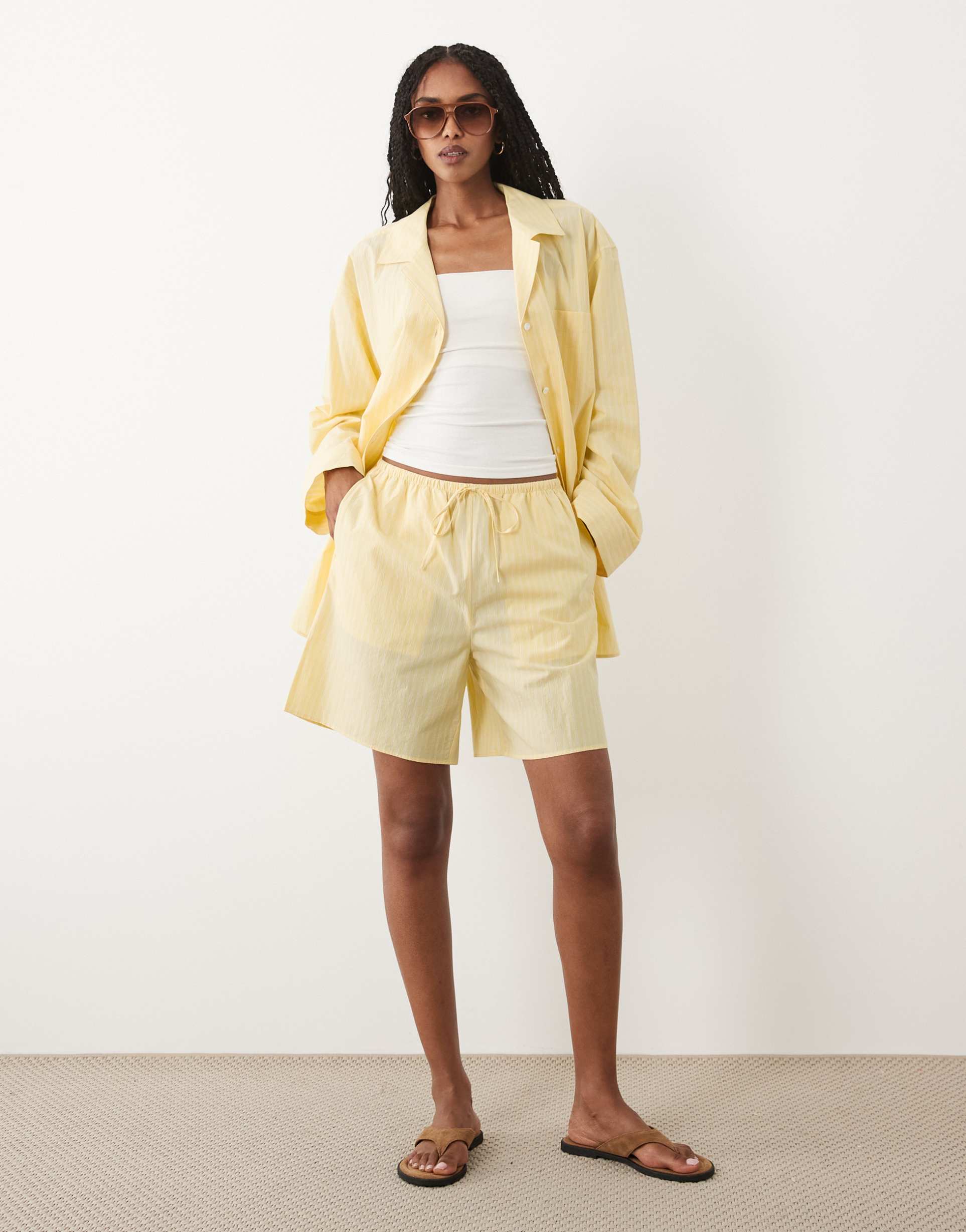 arket pure cotton beach shorts in yellow striped print - part of a set