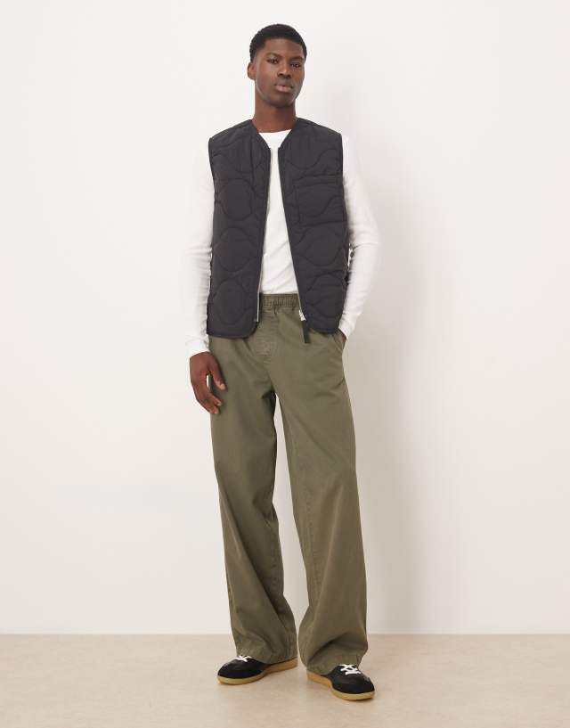 ARKET quilted vest with zip front in black | ASOS