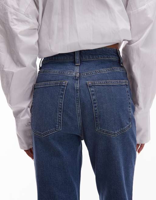 ARKET – RAIN – Mellanblå, tvättade, utsvängda jeans med smal passform, 4 av 5