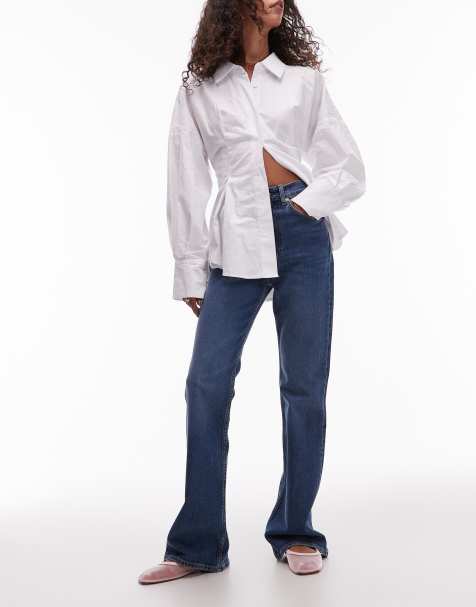 ARKET Rain slim flare jeans in mid wash blue