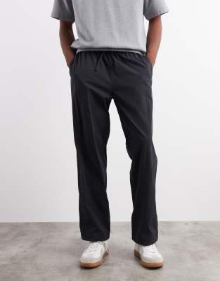 Arket ARKET relaxed tech trousers with drawstring waist in black