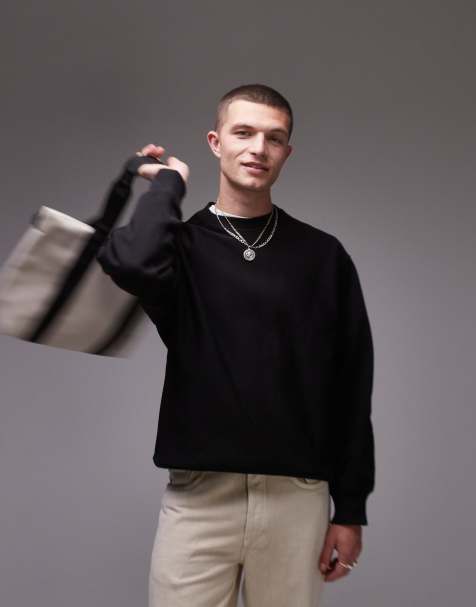 ARKET - Ruimvallend sweatshirt van zware stof met zijpanelen in zwart - view 1