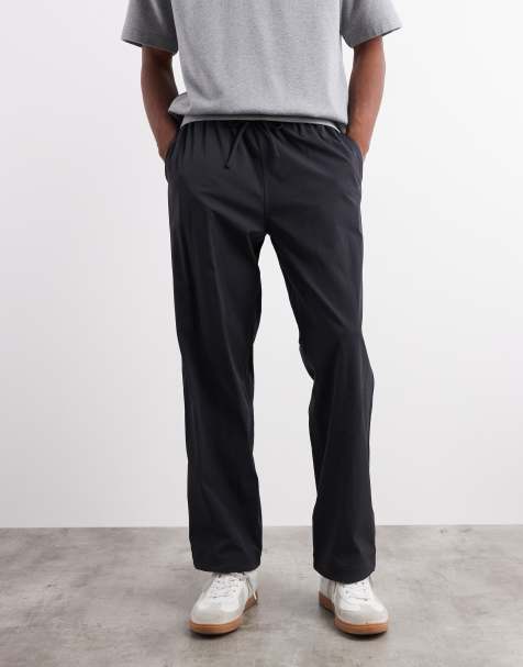 ARKET relaxed tech trousers  with drawstring waist in black