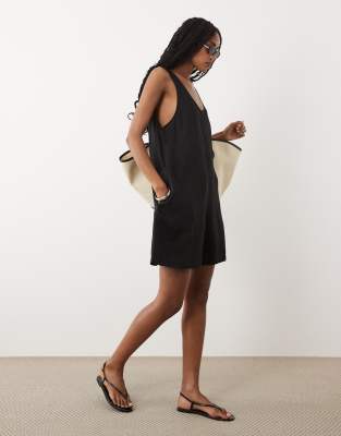 Strand-Playsuit aus reinem Leinen in Schwarz Schwarz S