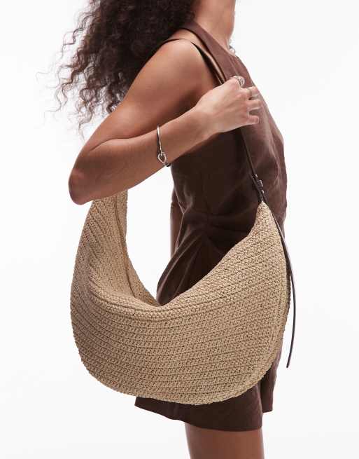 ARKET straw curved slouchy cross body bag with black leather details contrast stitches in light neutral