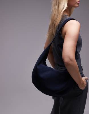 Arket suede curved slouch shoulder bag in dark blue