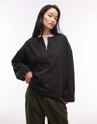 ARKET - Sweatshirt aus reiner Baumwolle in Schwarz mit V-Ausschnitt