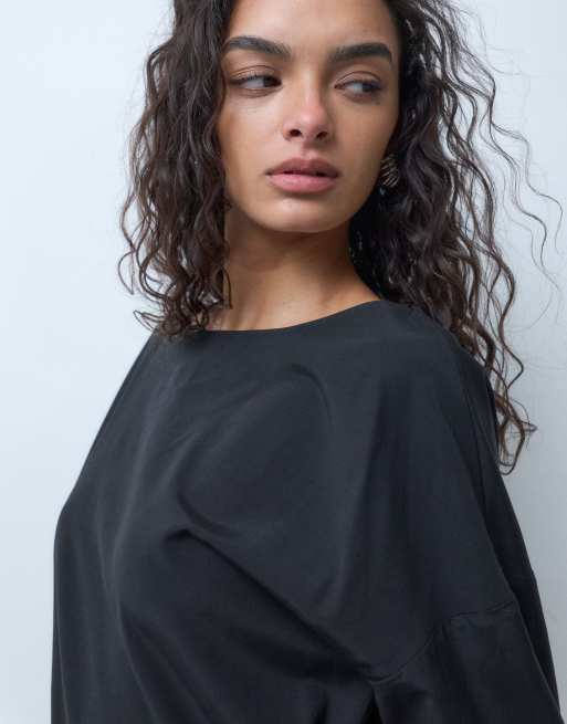 ARKET top asimétrico de manga larga con cintura ajustada en negro, 5 de 5
