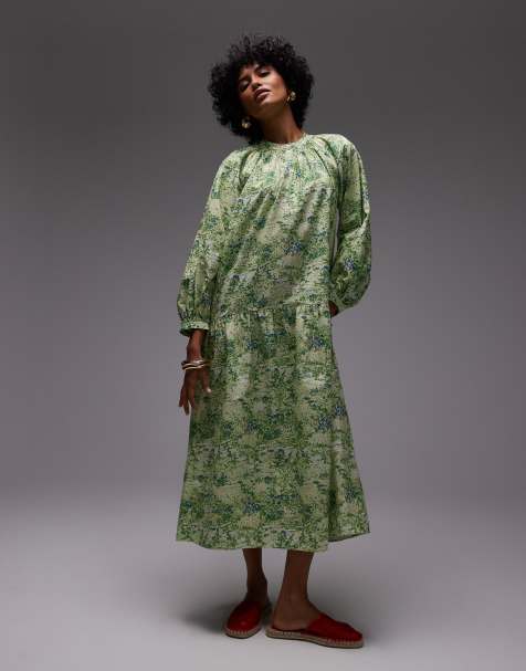 ARKET – Wadenlanges, gesmoktes Kleid aus reiner Baumwolle mit grünem Blättermuster und tiefer Taille - view 1
