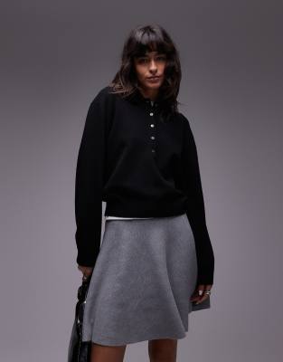 wool knit sweater with deep placket polo collar in black