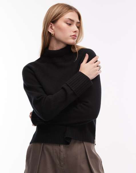ARKET wool sweater with high neck and deep cuffs in black