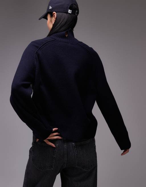 ARKET wool sweater with high neck and deep cuffs in navy blue