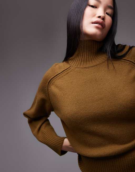 ARKET wool sweater with high neck and deep cuffs in olive green