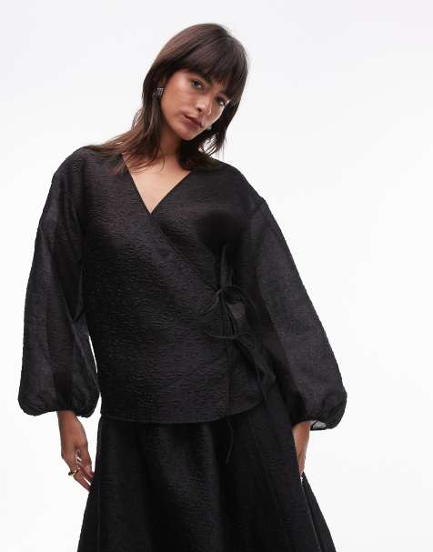 ARKET wrap front brocade blouse with puff sleeves and bow detail in black - view 1