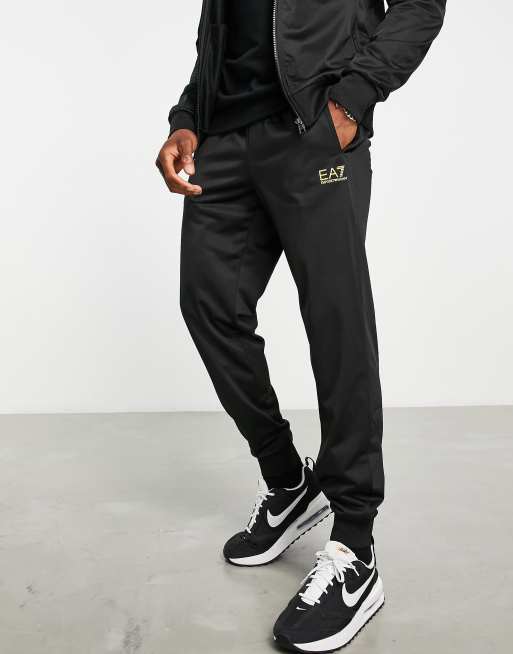 Armani EA7 Core ID tricot neck tracksuit in black with gold logo